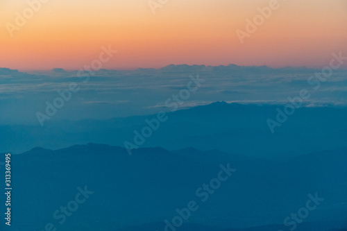 aerial of cloud and mountain in the evening © sirfujiyama