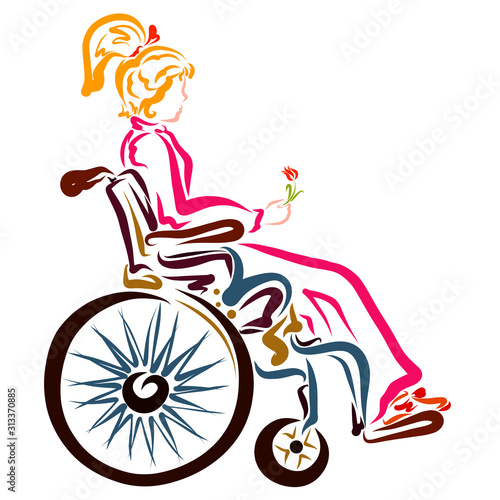 girl in a wheelchair with a flower in her hand