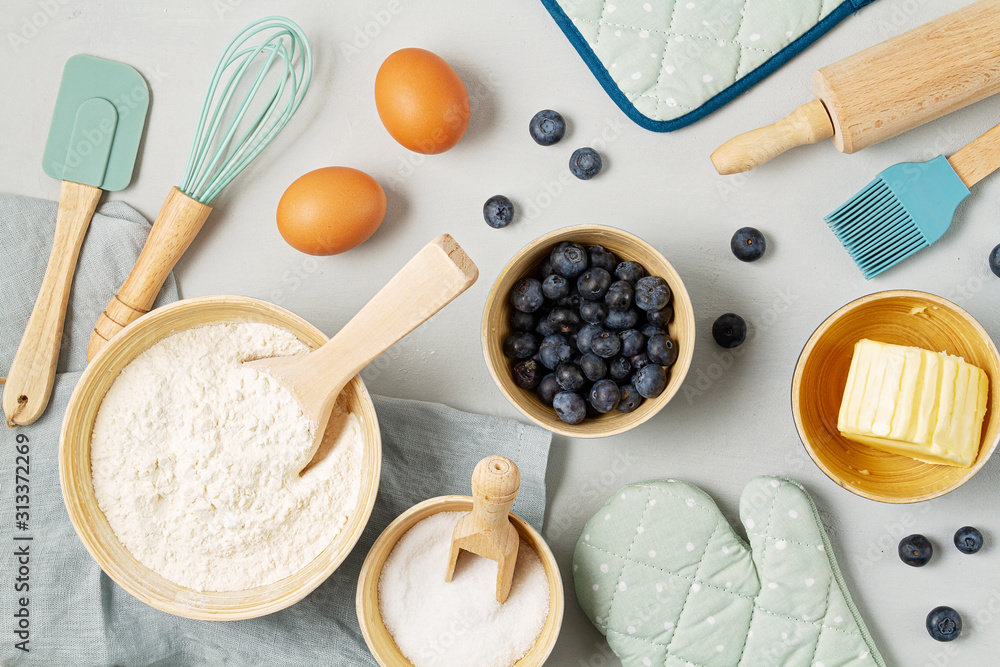 Rustic baking ingredients flat lay. Homemade pastry, baking. Top view flat lay background. Copy space. Healthy organic food Rustic baking ingredients flat lay. Homemade pastry, baking. Top view flat lay background. Copy space. Healthy organic food