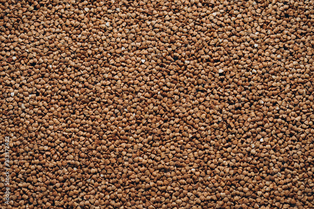 natural buckwheat grain background. texture background natural buckwheat grain background. texture background