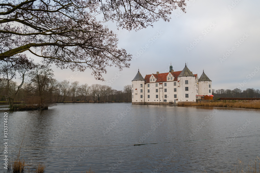Glücksburg Castle from the side by the water and bad weather Glücksburg Castle from the side by the water and bad weather
