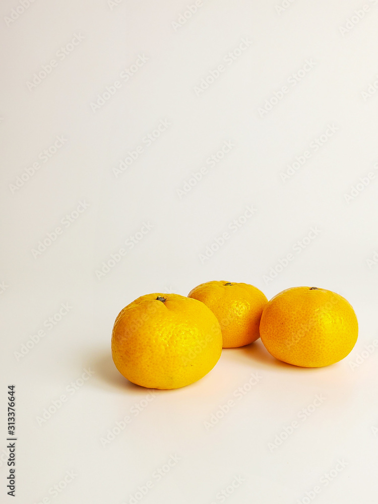 Ripe citrus tangerines isolated on a white background.