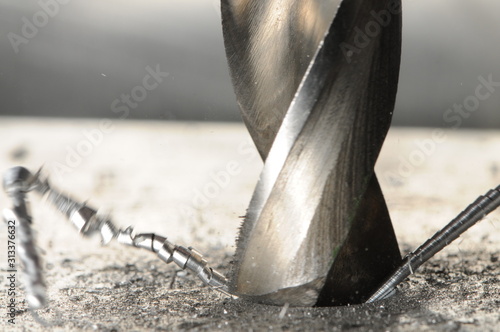 Close-up metal drilling process photo