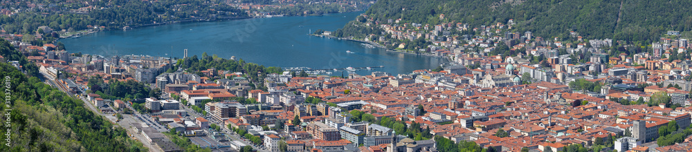 Como - The panorama of the city among the mountains and lake Como.