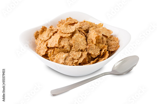 Corn flakes in white plate on a white background isolated