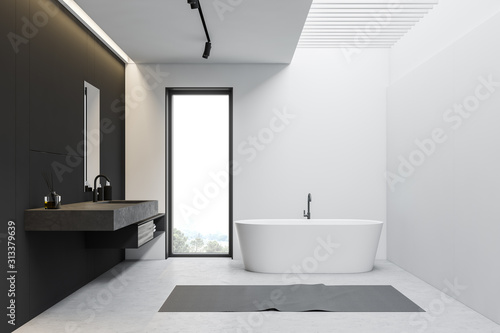 White and gray loft bathroom with tub and sink