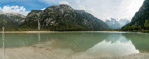 Early autumn view of dolomites mountain and durrensee lake near South Tyrol, Italy. photo