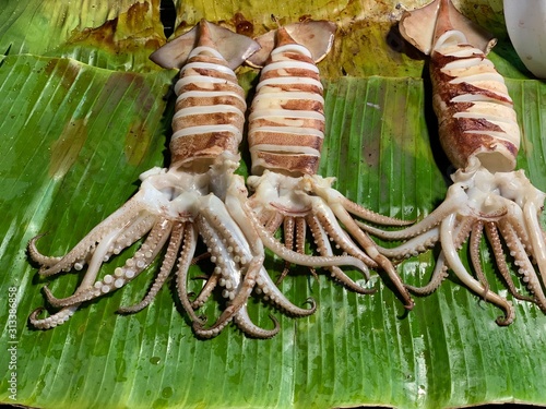 tasty fired squid on thailand bangkok street	 photo