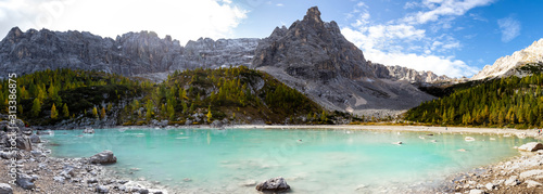 Panoramic view to Sorapis Lake, an unbelievable turquoise and azure lake in the heart of the Dolomites near Cortina D'Ampezzo. Italy, South Tyrol. 