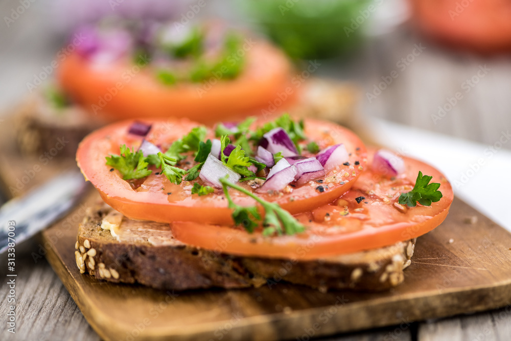 Some healthy Tomato Sandwich (selective focus; close-up shot) Some healthy Tomato Sandwich (selective focus; close-up shot)