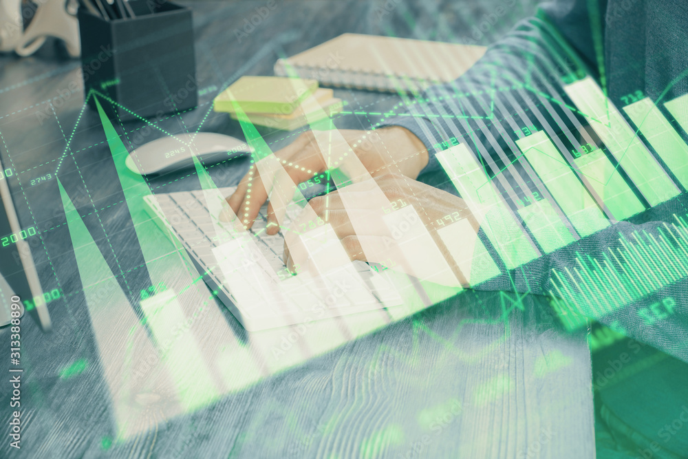 Stock graph with businessman typing on computer in office on background. Concept of analysis. Double exposure. Stock graph with businessman typing on computer in office on background. Concept of analysis. Double exposure.