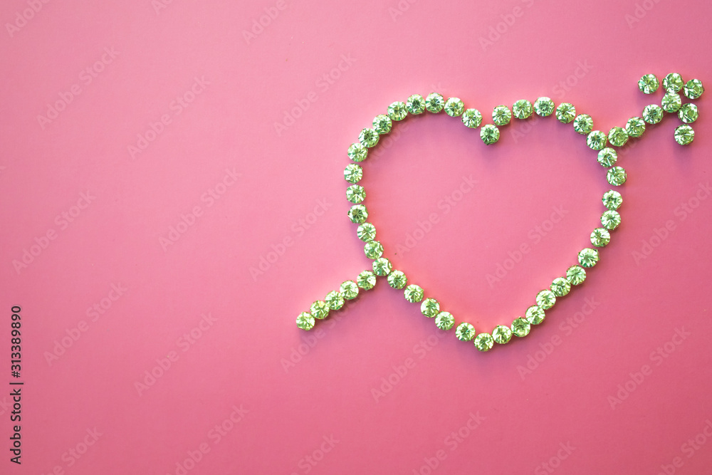  diamond heart with arrow, valentines day, pink background, flat lay
