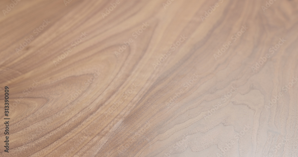 Closeup background of walnut table Closeup background of walnut table