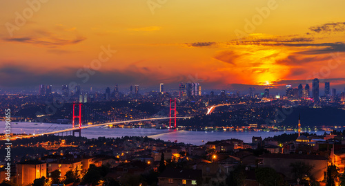 Bright sunset and the Boshporus Bridge in Istanbul, view from the Asian side, Turkey