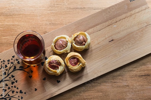 .tea, bagel, hot dog puff pastry concept