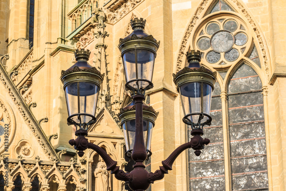 Streetlamps of Metz in front of the church