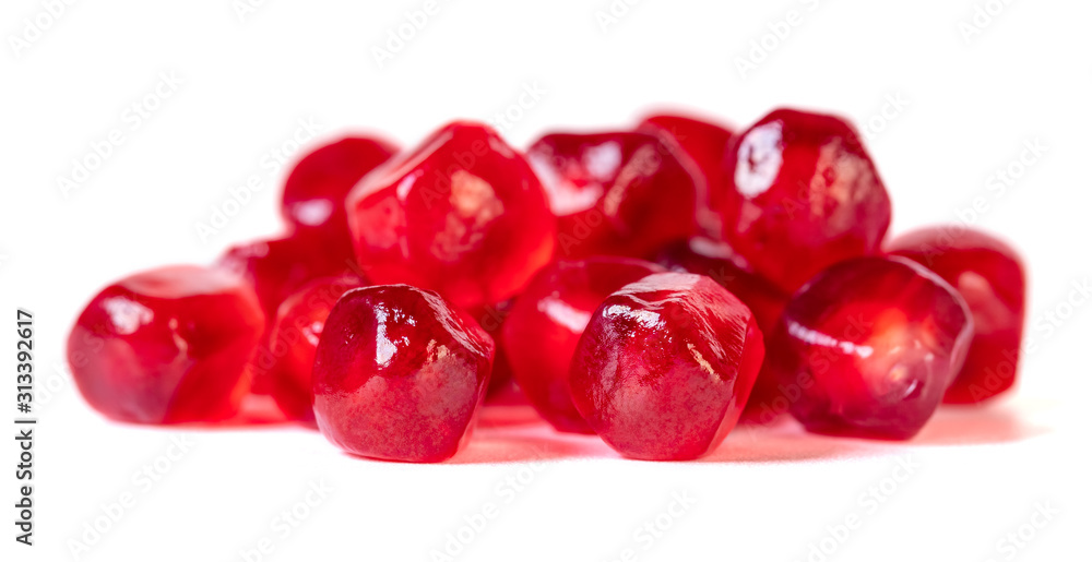 Fresh pomegranate seeds isolated on white background. Close up. Fresh pomegranate seeds isolated on white background. Close up.