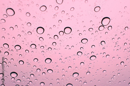 Rain Drops Water on Window with colored background