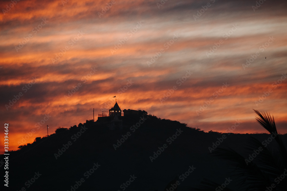 Fototapeta premium Beautiful clouds above the hills during sunset at Wankaner, Gujarat, India