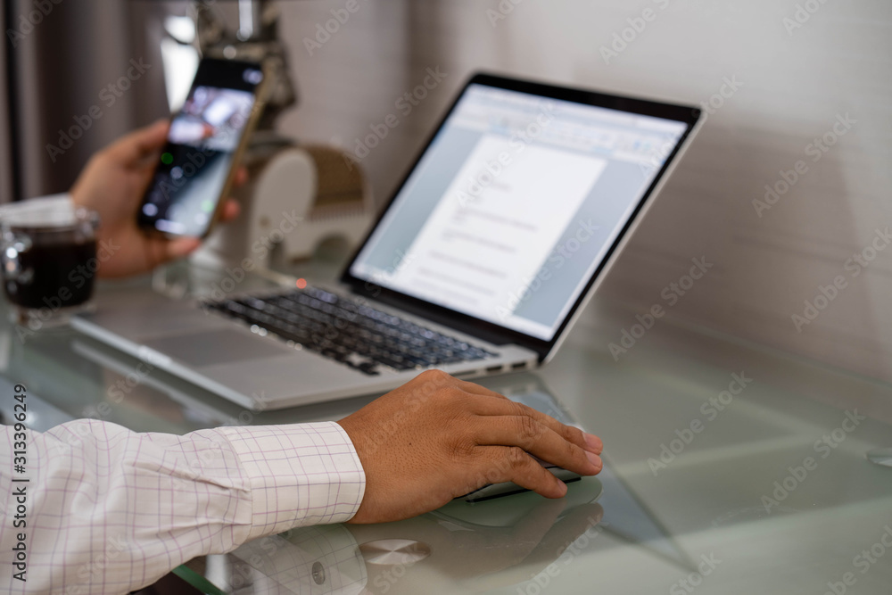 Man is working at home through social media. Man is working at home through social media.