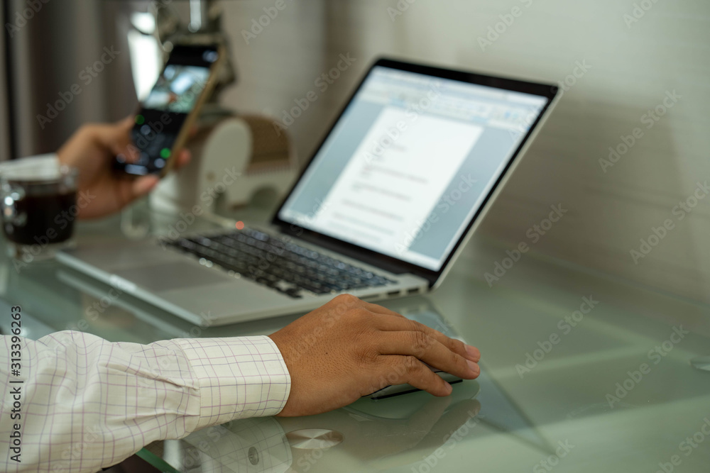 Man is working at home through social media. Man is working at home through social media.