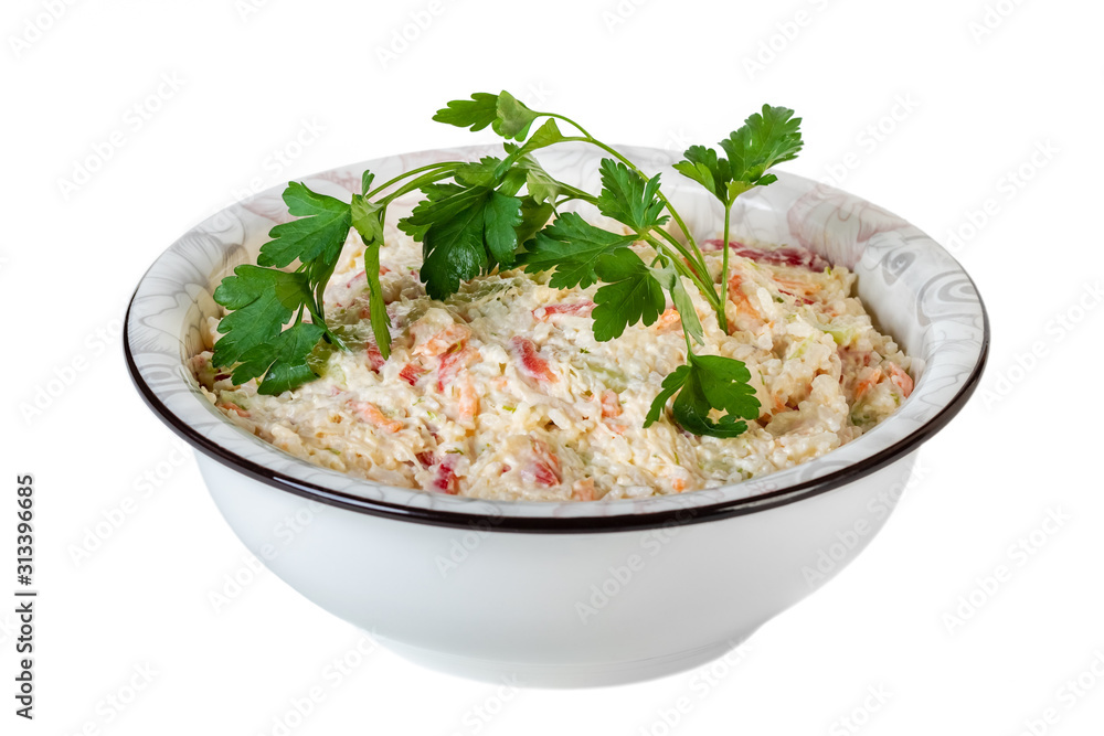 salad of rice, vegetables with mayonnaise in a bowl on a white background salad of rice, vegetables with mayonnaise in a bowl on a white background