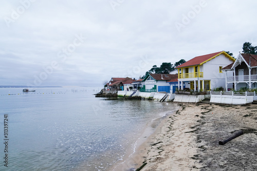 beach winter wooden colored fisherman wood house cabins on bassin d'Arcachon France