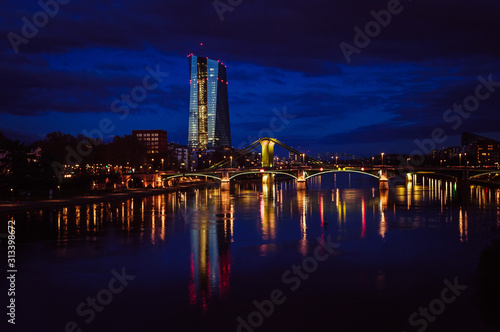 Spectacular view on the night city of Frankfurt reflecting in the river