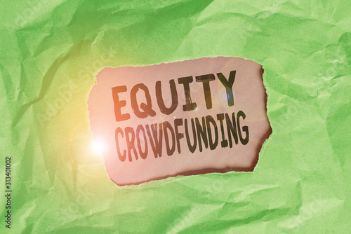 Word writing text Equity Crowdfunding. Business photo showcasing raising capital used by startups and earlystage company Green crumpled ripped colored paper sheet centre torn colorful background photo