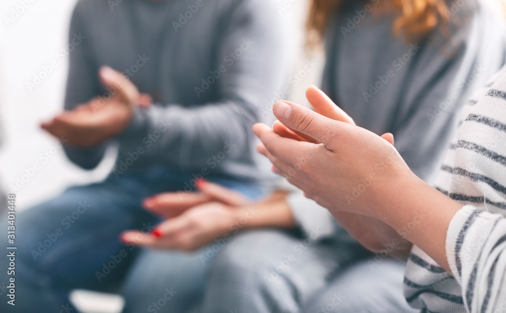 Patients clapping hands at psychotherapy session, close up Patients clapping hands at psychotherapy session, close up