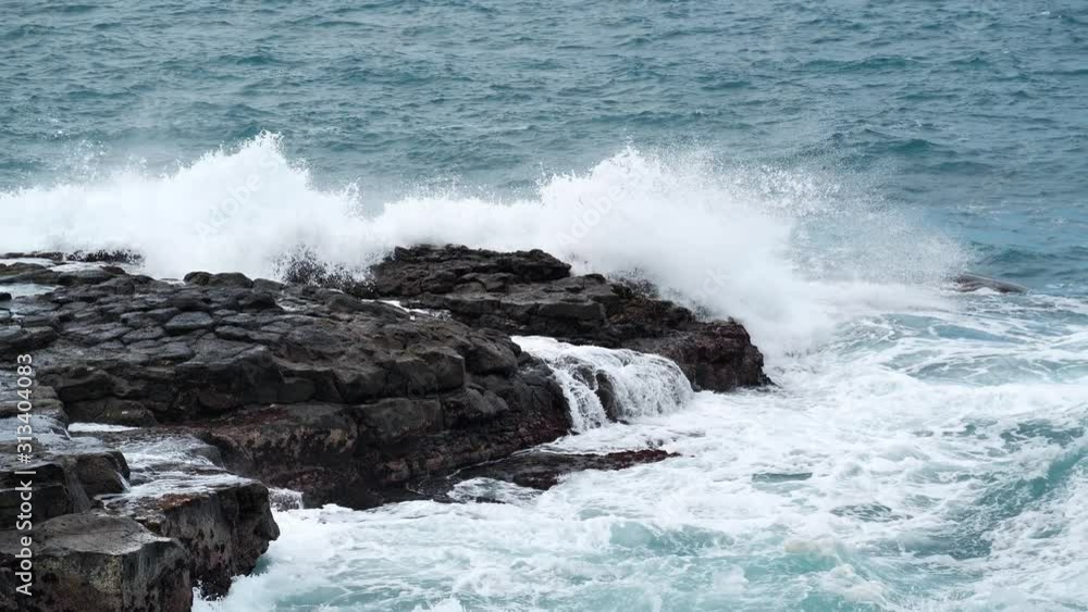 Slow motion, breaking waves on Tenerife island, Canary islands, Spain Slow motion, breaking waves on Tenerife island, Canary islands, Spain