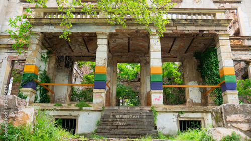 Картината върху платно Mostar, Bosnia and Herzegovina - April 2019: Palace bombed during the 1992-1995 Bosnian War facing the Zrinjski City Park, a public park on the western side of the city of Mostar