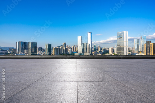 empty floor with city skyline