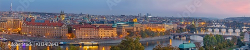 Prague - The panorama of the city with the bridges at dusk. photo