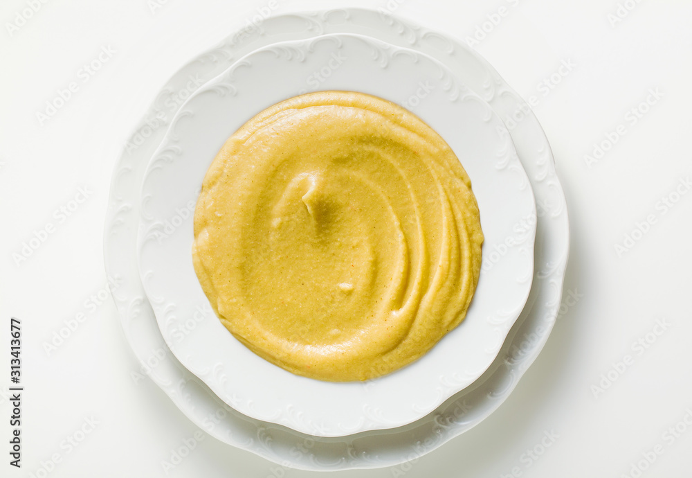 mashed vegetables in a plate on the table. healthy cuisine for children or family mashed vegetables in a plate on the table. healthy cuisine for children or family