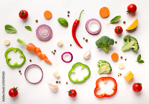 Healthy flat lay of sliced vegetables composition photo