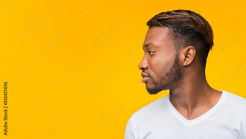 Profile Portrait Of African American Man Over Yellow Background, Panorama Profile Portrait Of African American Man Over Yellow Background, Panorama