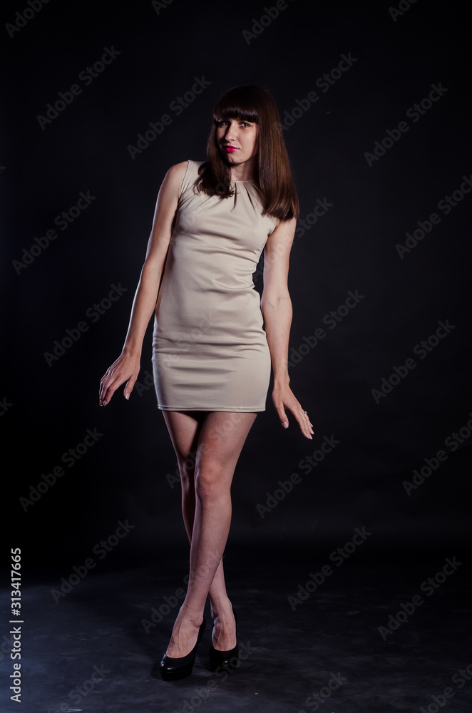 beautiful brunette girl in short blue dress beautiful brunette girl in short blue dress