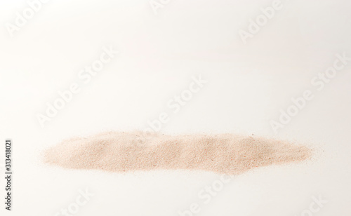 A lot of dry beach sand on white background