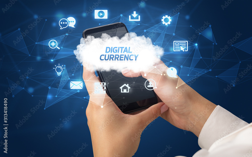 Female hand holding smartphone with DIGITAL CURRENCY inscription, cloud technology concept Female hand holding smartphone with DIGITAL CURRENCY inscription, cloud technology concept