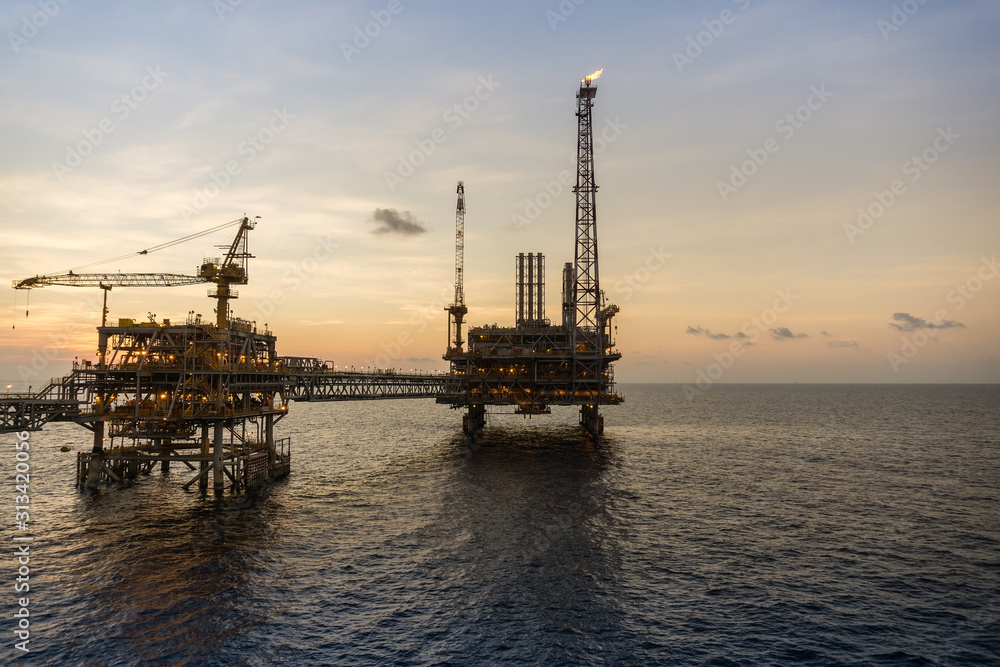Oil production platform complex during sunset at Terengganu oil field