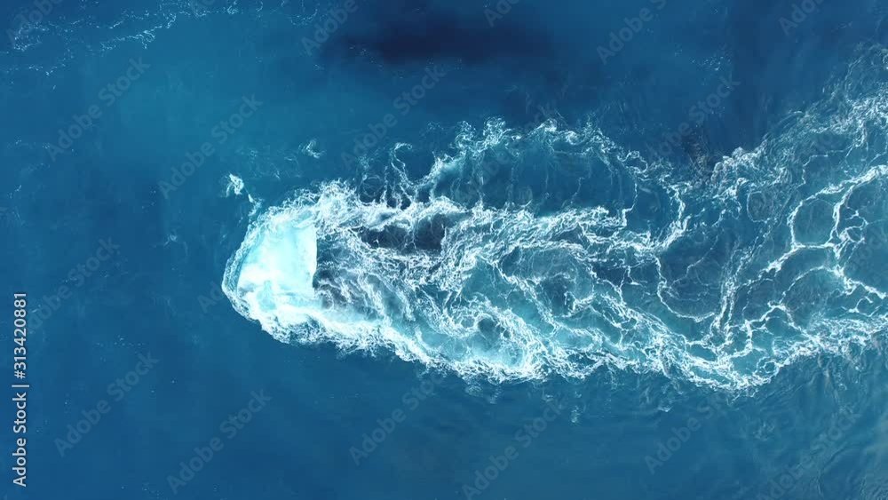 Iceberg in a channel leading out to sea