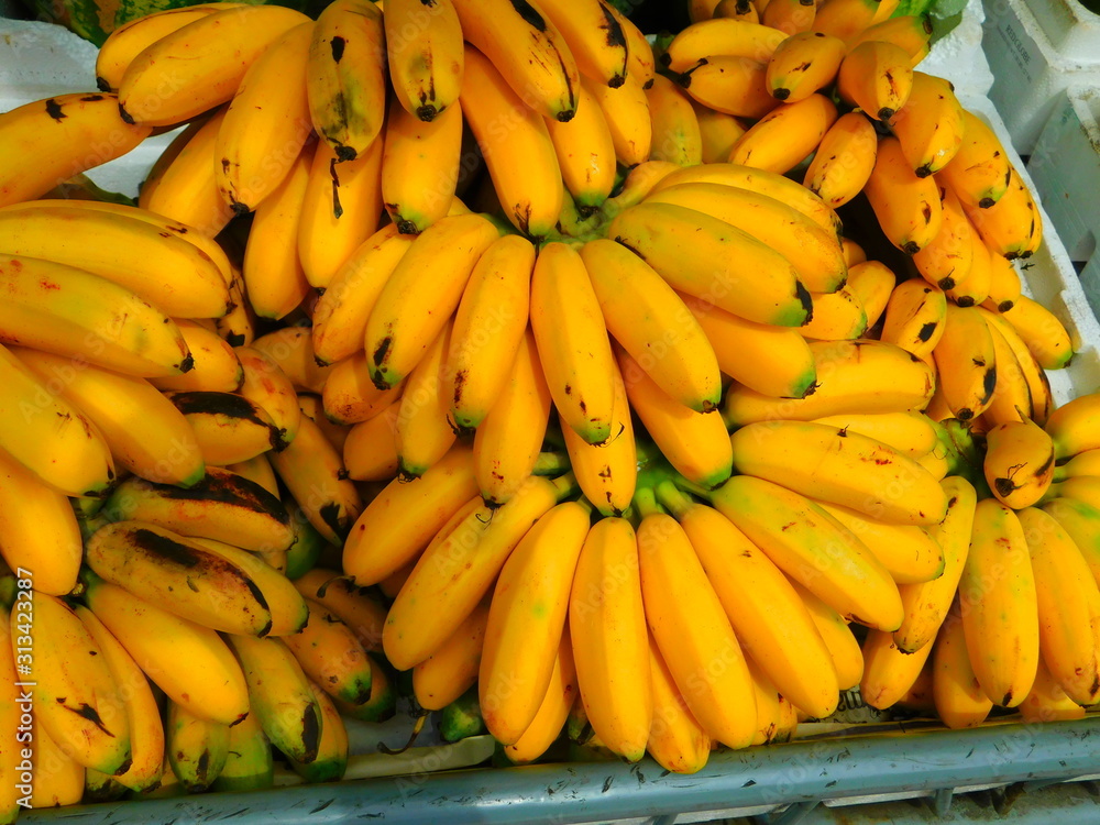 ripe bananas on display at the market