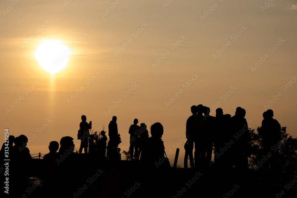 Tourists are watching the light of the sun in the morning