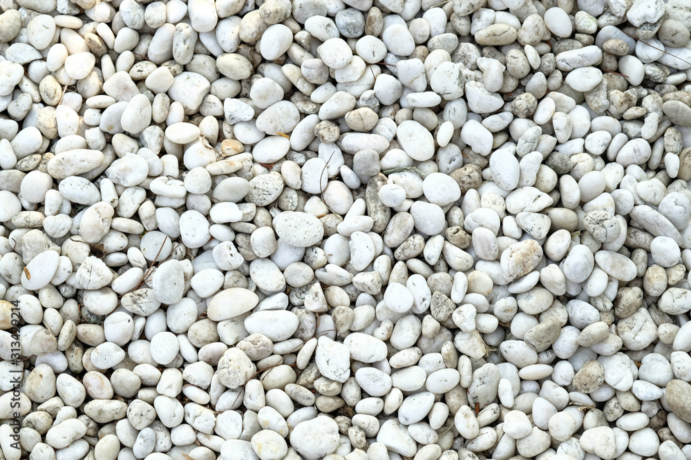 Background texture of stone wall. abstract background with dry round reeble stones. Background texture of stone wall. abstract background with dry round reeble stones.