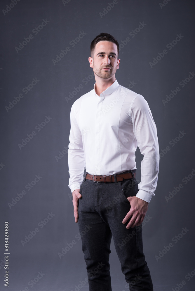 man in a white shirt and dress pants
