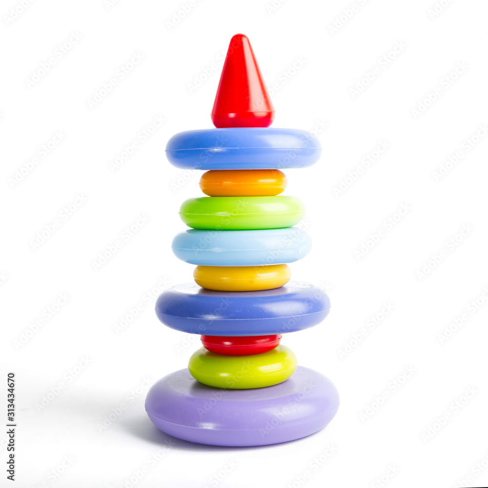 Pyramid build from colorful plastic rings, isolated on white. Pyramid build from colorful plastic rings, isolated on white.