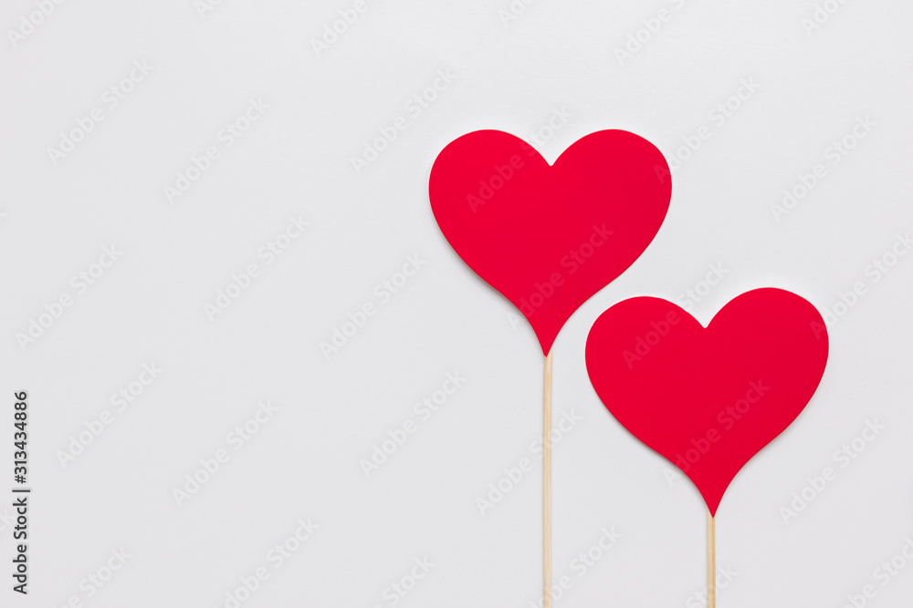 Stock photo of two red paper hearts on a white background Stock photo of two red paper hearts on a white background