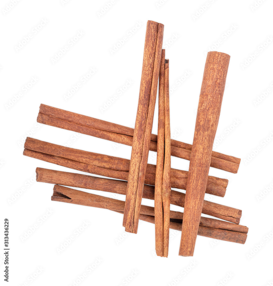Cinnamon sticks isolated on white background. Top view Cinnamon sticks isolated on white background. Top view