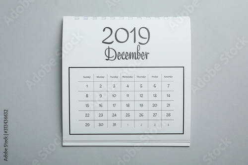 December 2019 calendar on light grey background, top view